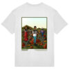 Back of a white t-shirt with artwork of a giant humans standing in a filed chained to the floor. they have houses wrapped around their torso like a t-shirt.